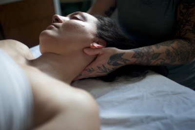 Marissa performing a neck massage